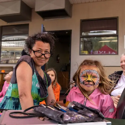 Child getting face painted