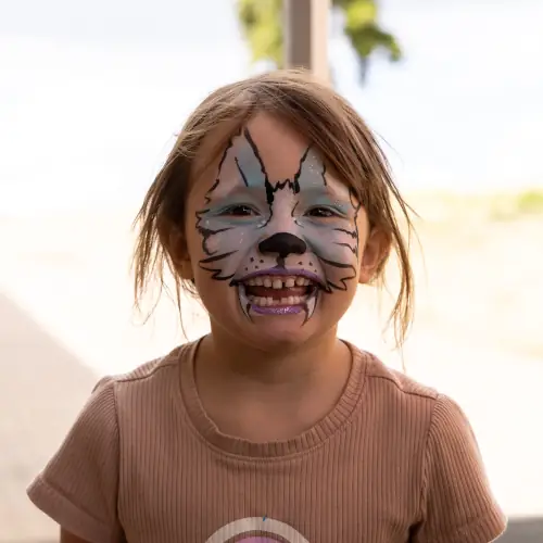Smiling kid enjoying KidsFest