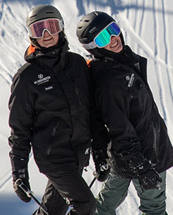 Two Mount Washington staff members in uniform