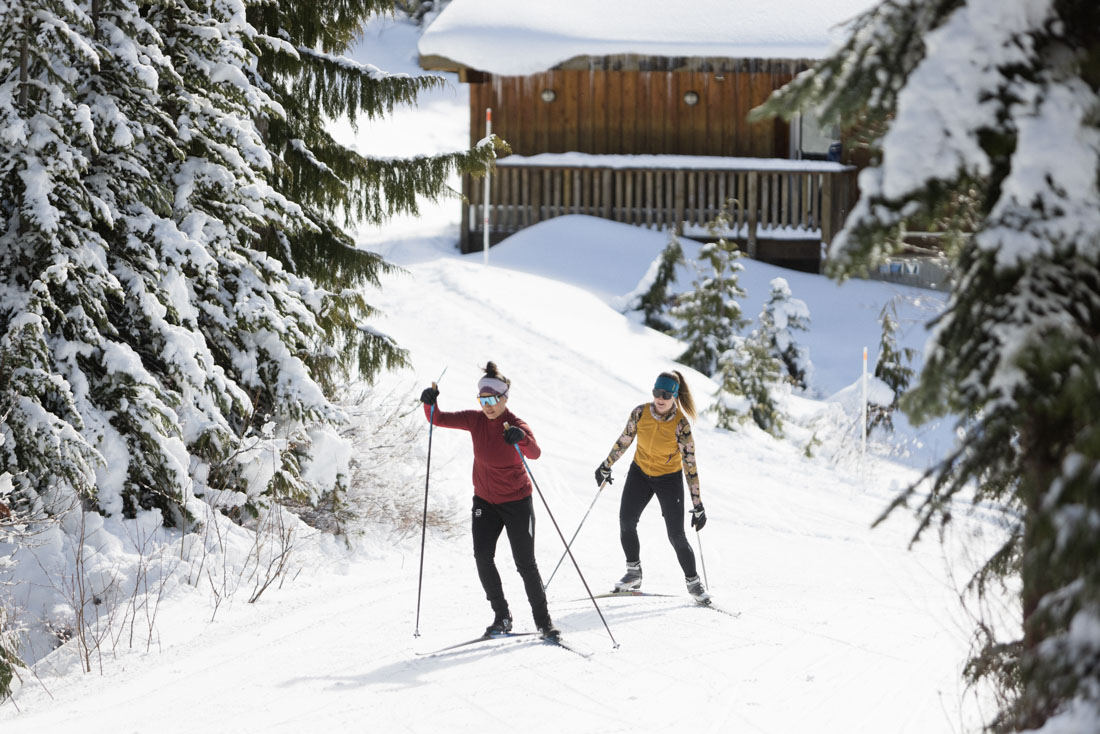 Nordic skier taking a lesson at the Raven Lodge trails